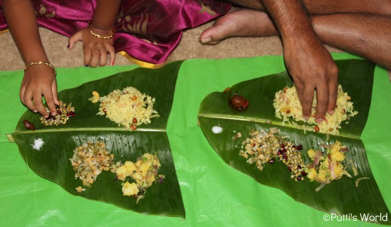 Food served on banana leaves, eaten by hand.